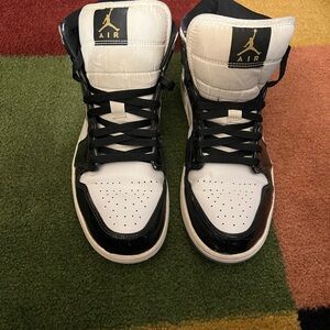 Jordan Black and White High-Top Sneakers